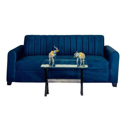 Navy blue three-seater fabric sofa with plush cushions, modern design, from RentalFurniture.in, perfect for living rooms.