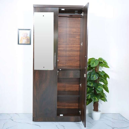 Wooden wardrobe with open door on a white background
