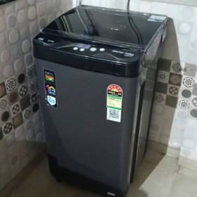 A black top-loading washing machine on rent in pune at low rental quick free delivery all over pune.