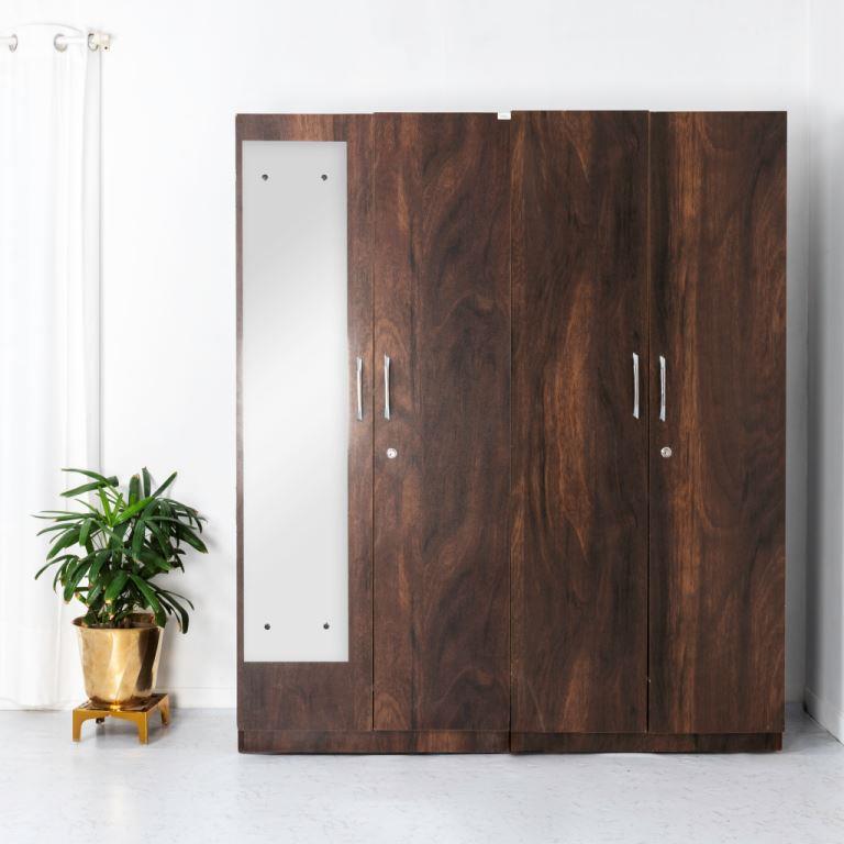 Carlton four-door wardrobe with full mirror, standard design, featuring sleek wood finish and spacious storage compartments.
